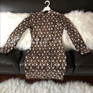 Gold and black sequin dress